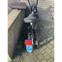 Gebruikte tomos met wok
