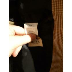 Verschillende kleding. Colberts en blouses