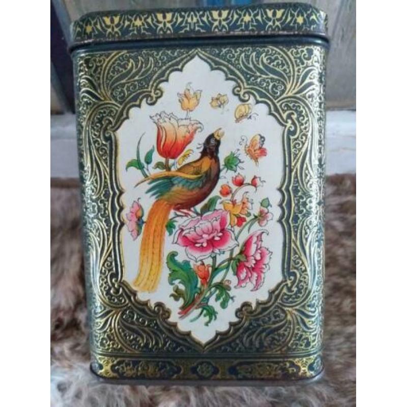 Oude Trommel met Reliëf * Paradijsvogel * Bloem