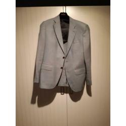 Verschillende kleding. Colberts en blouses