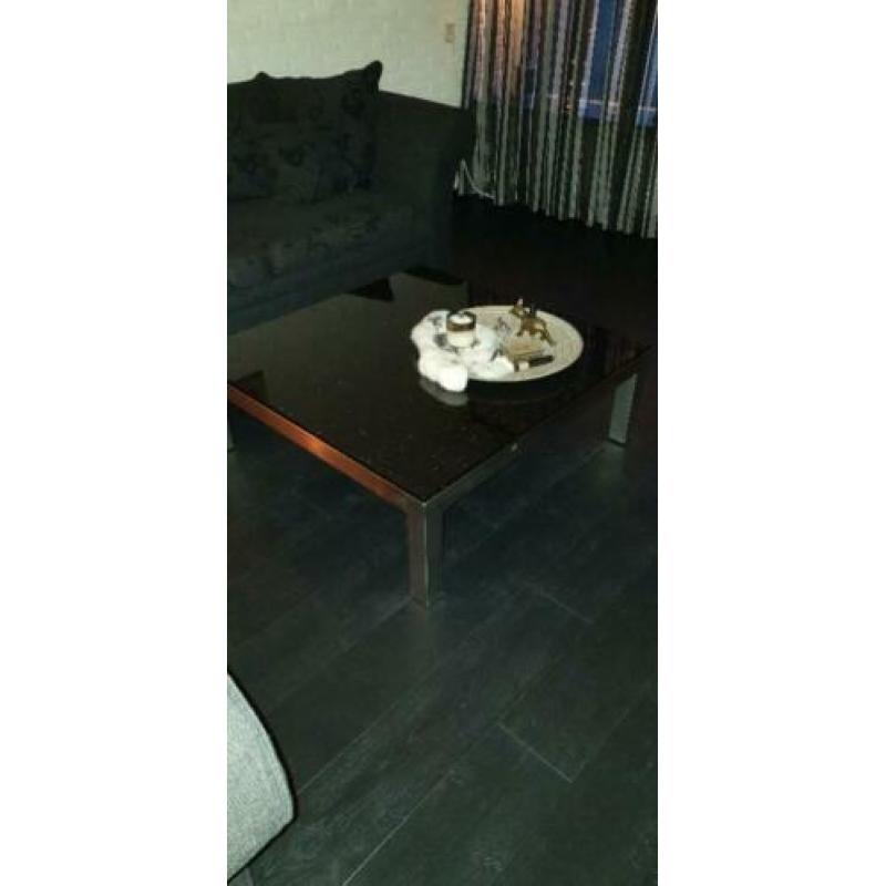 Mooie granieten salontafel met rvs poten