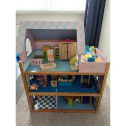 Super mooi poppenhuis met toebehoren!
