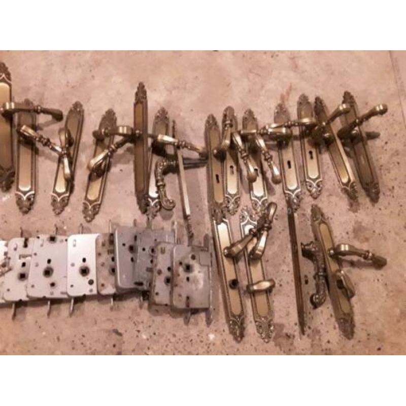 11 stel deurkrukken en sloten koper