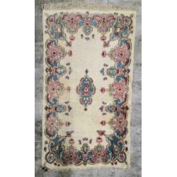 Handgeknoopt tapijt Perzisch Kirman roze blauw wol 85x155cm