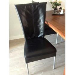 4 zwart lederen eetkamerstoelen