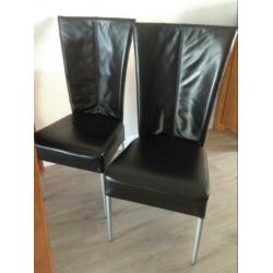 4 zwart lederen eetkamerstoelen