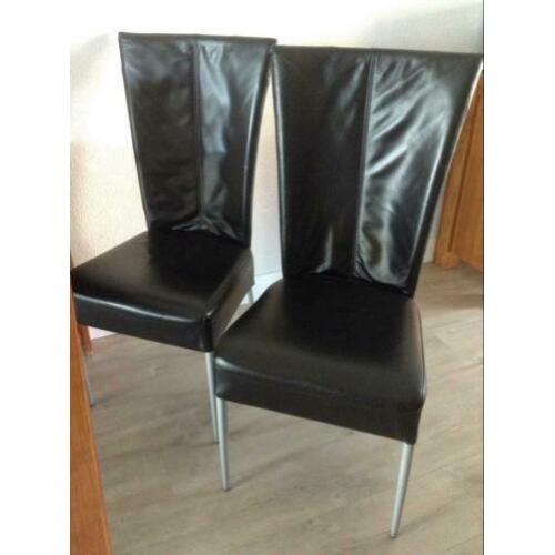 4 zwart lederen eetkamerstoelen