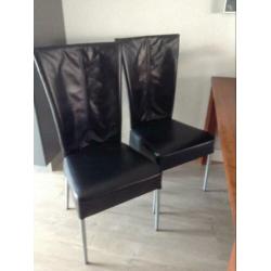 4 zwart lederen eetkamerstoelen