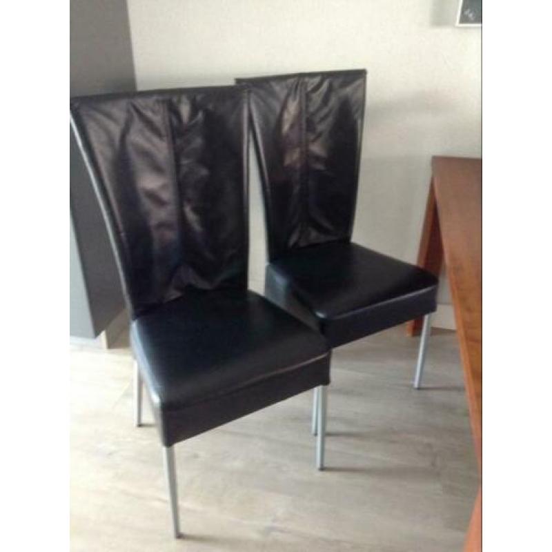 4 zwart lederen eetkamerstoelen
