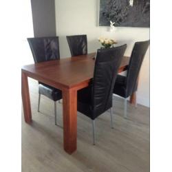 4 zwart lederen eetkamerstoelen