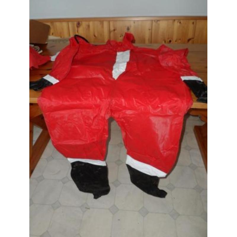 Kerstman pak met cape en masker en muts