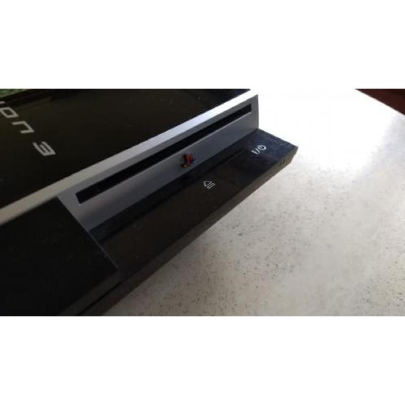 Playstation 3 met 2 controllers en diverse spellen