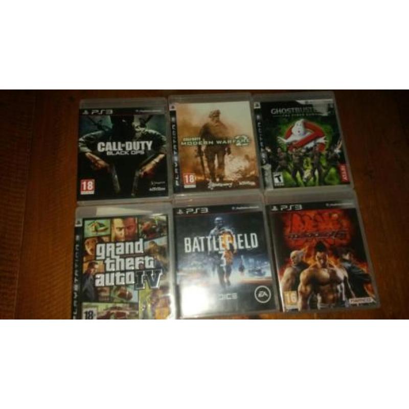 Playstation 3 met 20 games te koop